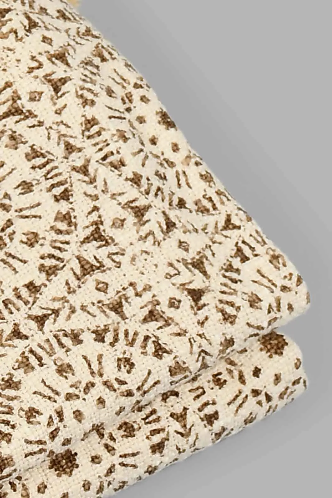 Beige Geometric Throw With Fringes